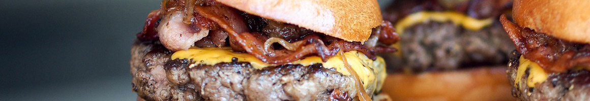 Eating Burger Deli at The Depot Deli & Grill restaurant in Helena, AL.